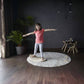 Girl Standing on PlanToys Balance Board