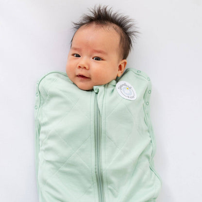 Baby wearing Dreamland Baby Bamboo Classic Swaddle - Sage