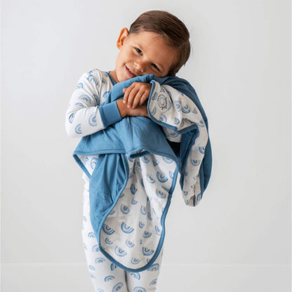 Child wearing Dreamland Baby Toddler/Kids Bamboo Pajamas - Blue Rainbow