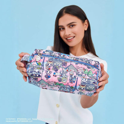 Woman holding tokidoki Be Dapper Toiletry Cosmetic Case -  C'est la vie à Paris