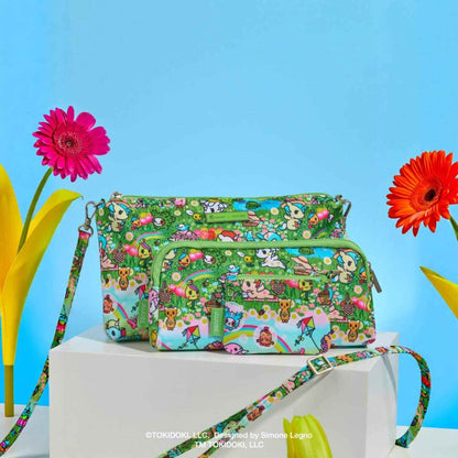 tokidoki Be Quick Clutch - Meadow Blooms on a blue background