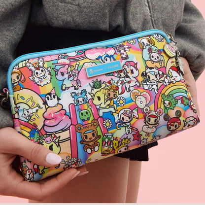 tokidoki Be Set Pouch held by a person against a pink background