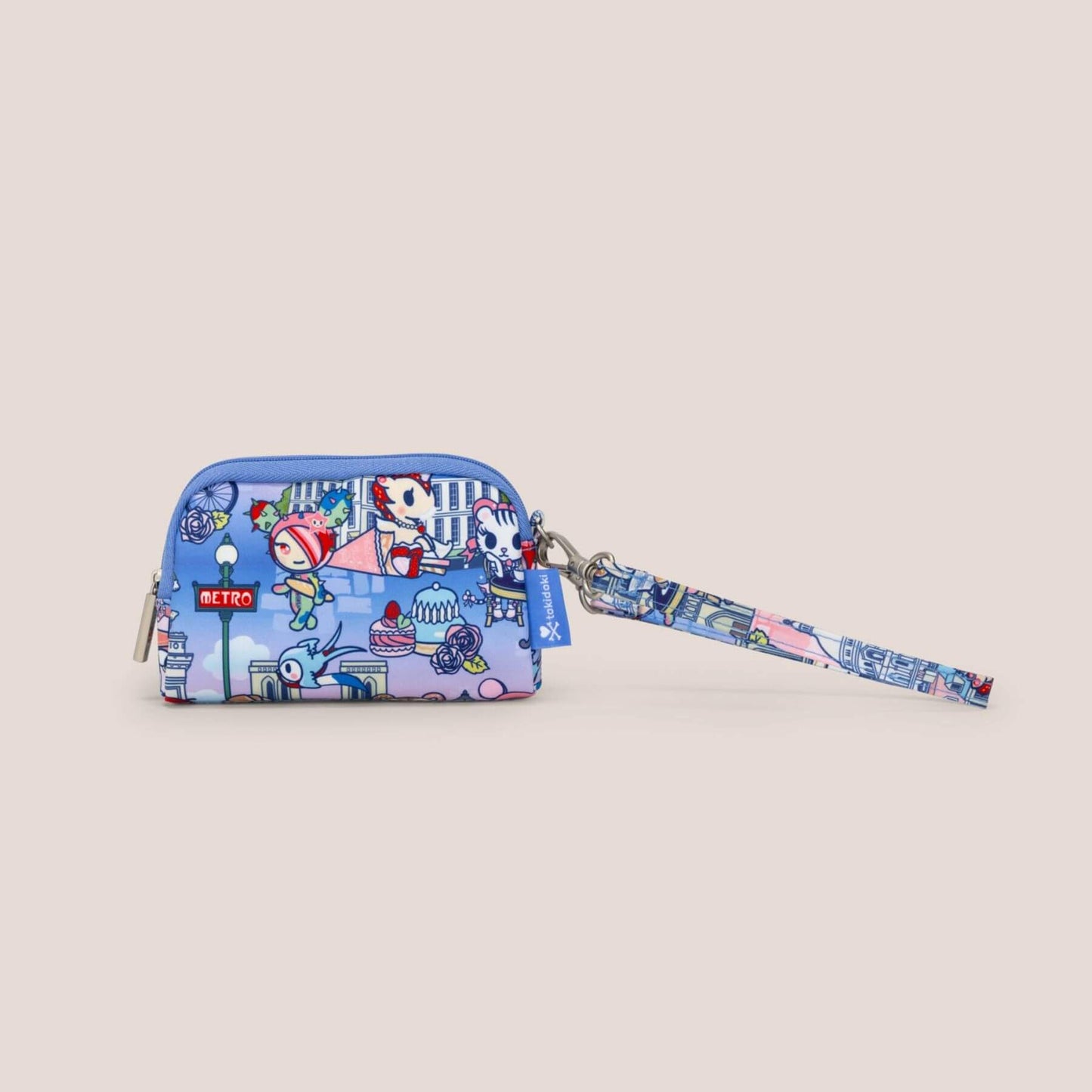 Small blue wristlet with cartoon character design on a beige background