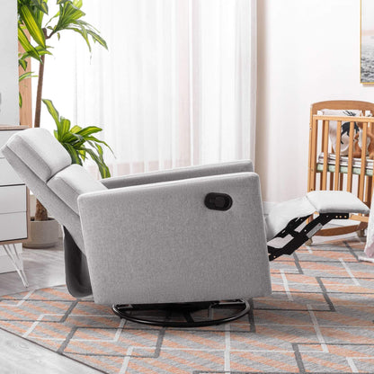 Gray recliner chair in a living room setting with plants and a rug.