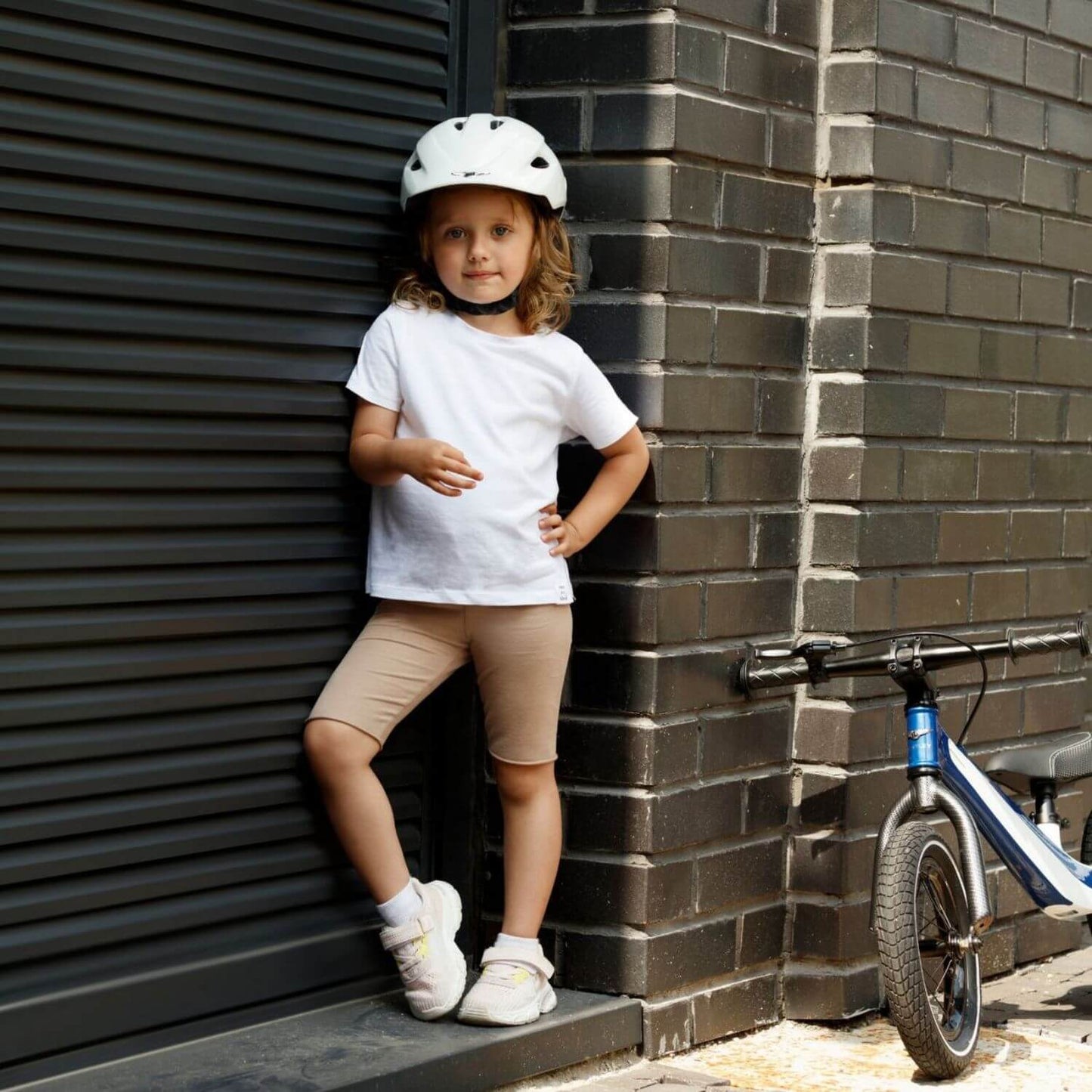 Girl Wearing Bentley Helmet Glacier White