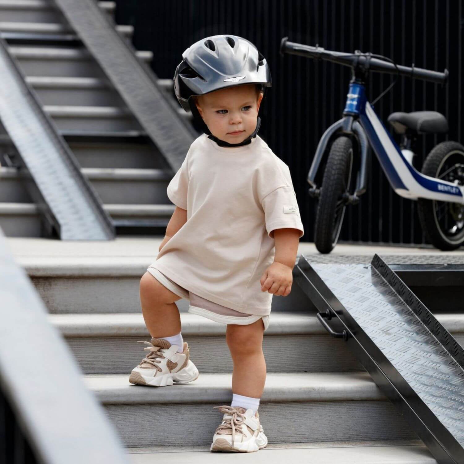 Boy Wearing Bentley Helmet Onyx Black