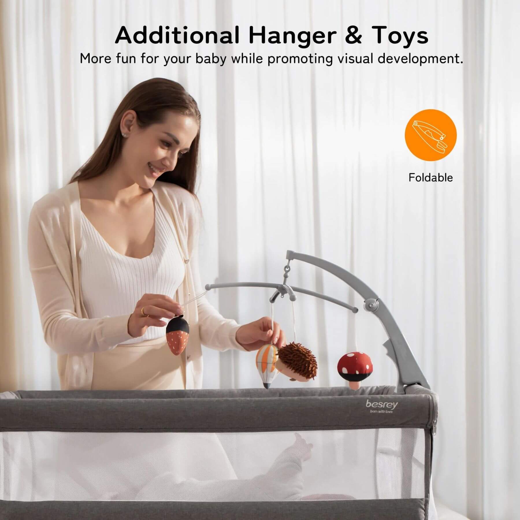 Mom Playing w/ Baby in Besrey 3-in-1 Newborn Bedside Crib