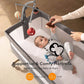 Baby Playing Mobile in Besrey 3-in-1 Newborn Bedside Crib with Mobile Toy Hanger