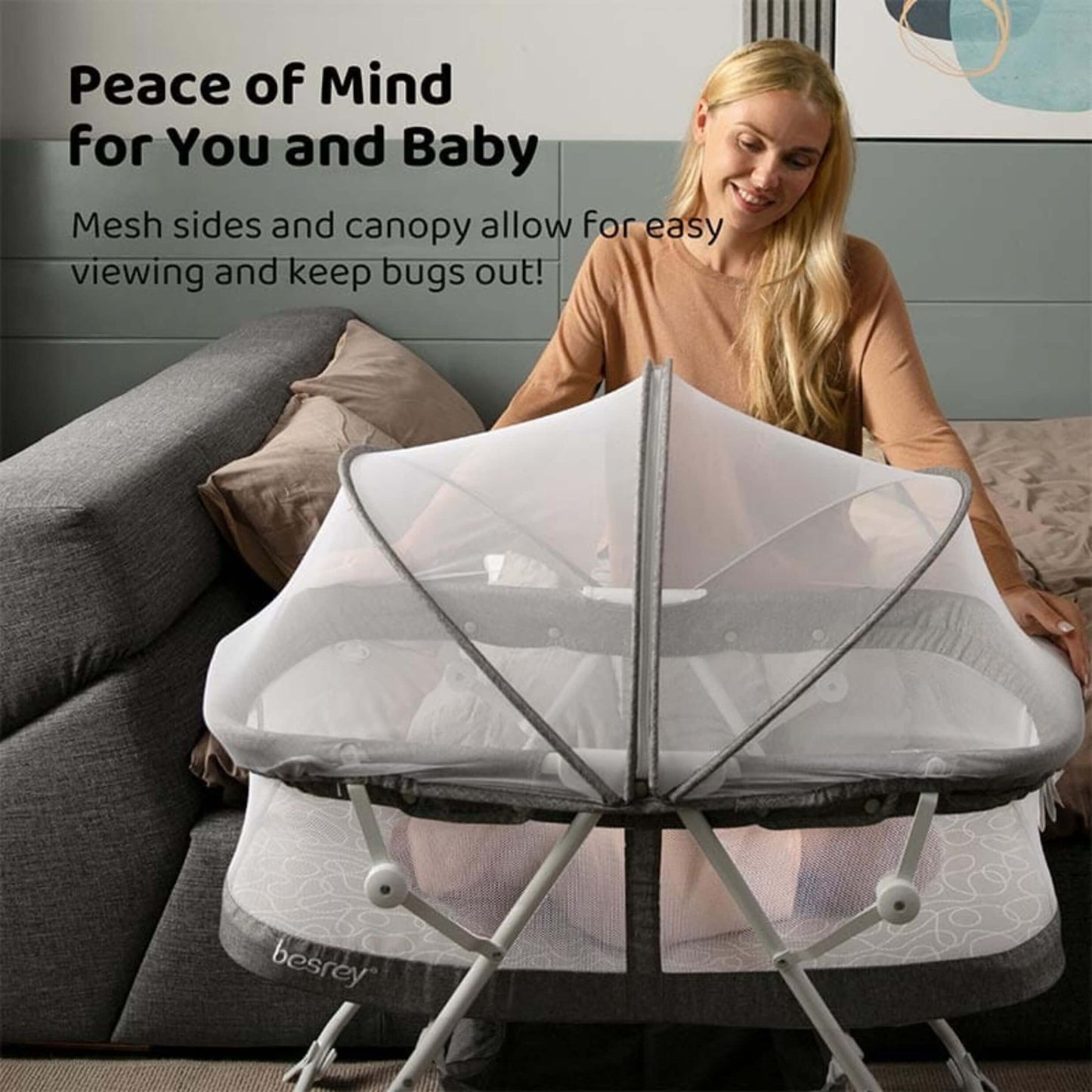 Mom Sitting Next to Besrey 3-in-1 Portable Baby Bassinet Cradle Easy Folding w/ Baby In It