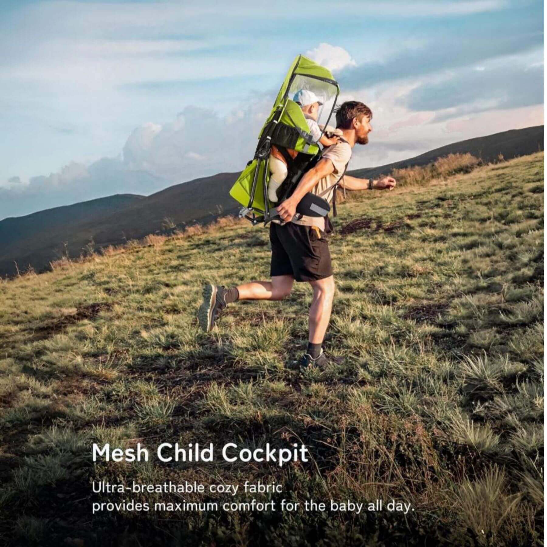 Person running outdoors with a child in Besrey Baby Backpack Carrier with Safety 3-Height Seat, set against a mountainous landscape.