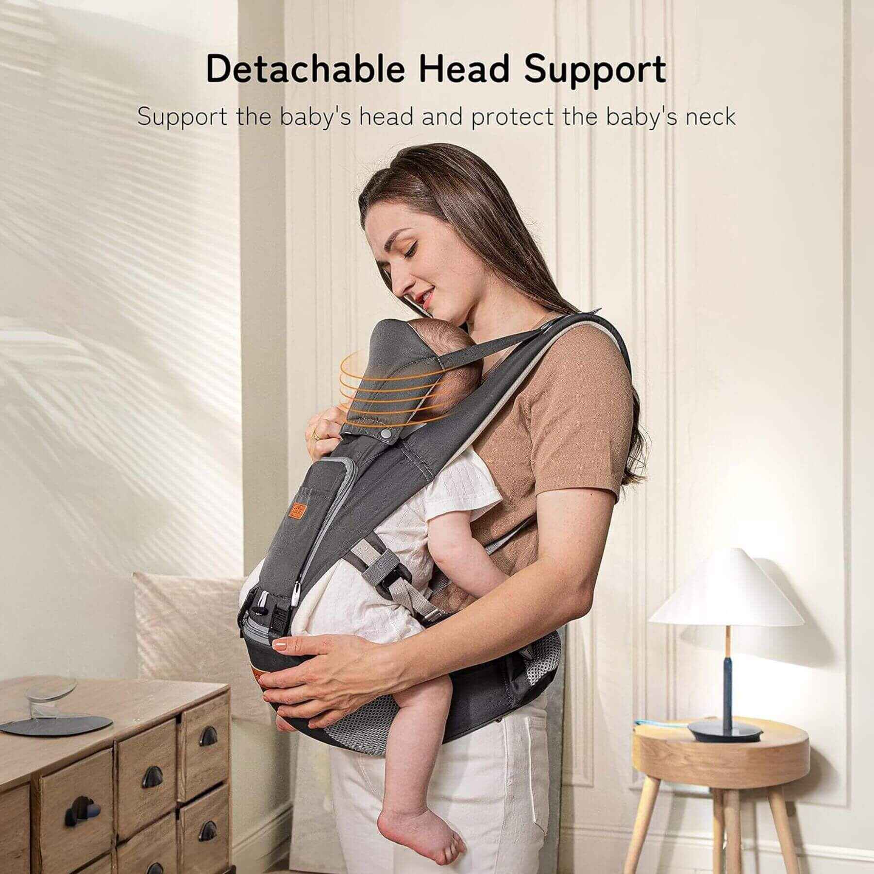 Woman holding a baby in Besrey Carrier with Front Facing Holder in a home setting.