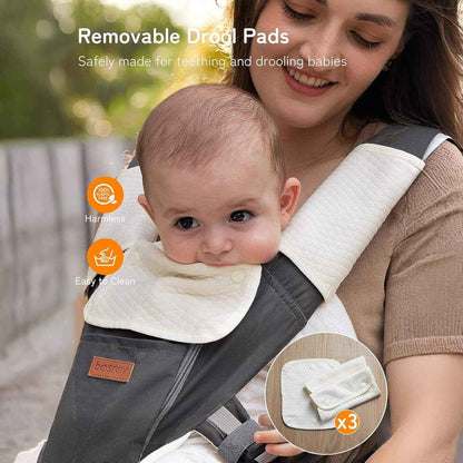 Woman holding a baby in Besrey Carrier with Front Facing Holder, outdoors.