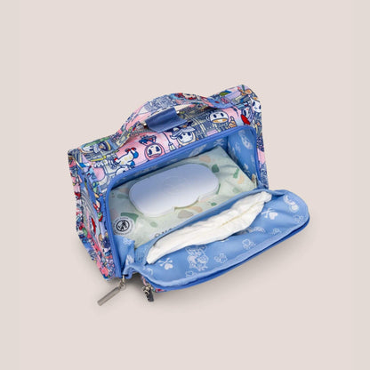 tokidoki The Bestie Small Messenger Handbag - C'est la vie à Paris with items on a light beige background