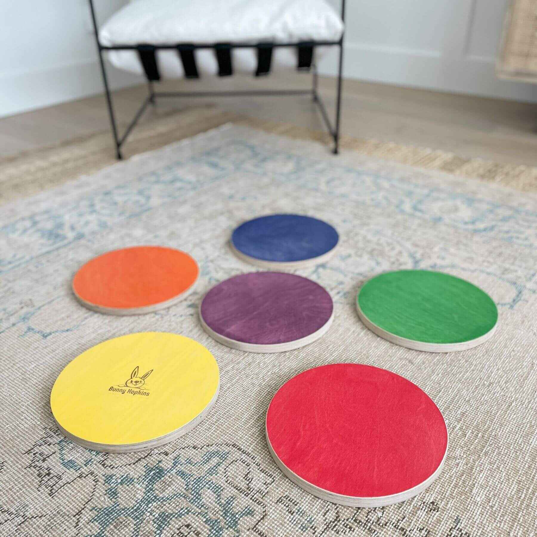 Bunny Hopkins Stepping Stones on a textured rug with a chair in the background