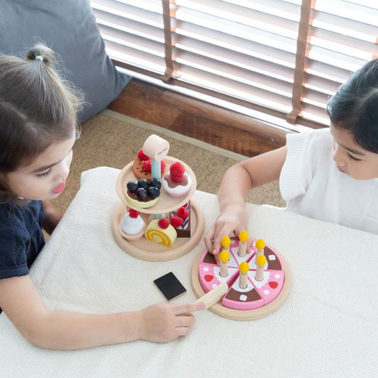 Kids Playing PlanToys Birthday Cake Set