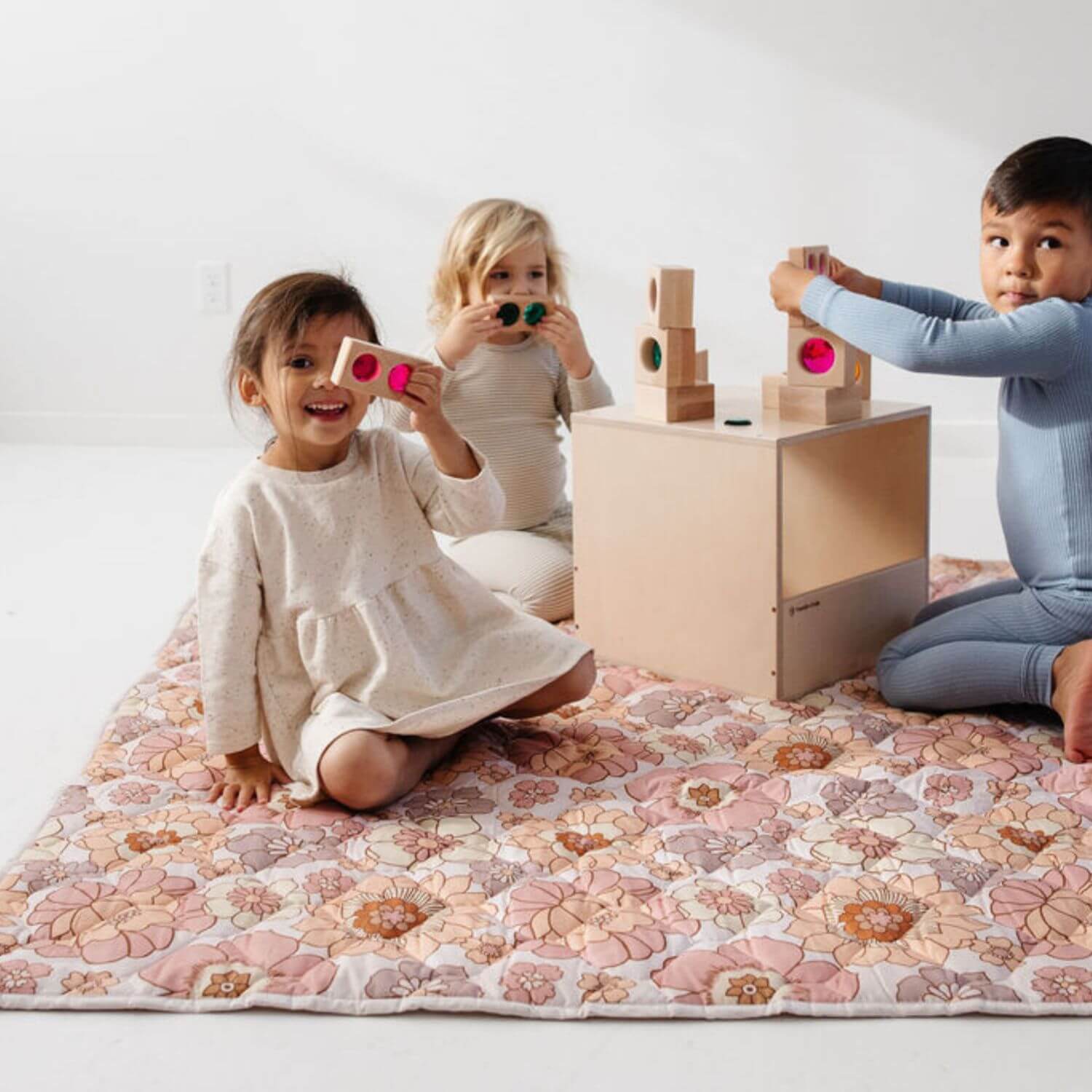 Kids playing toys on Toki Kids Blooms Picnic Blanket