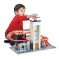 Child playing with Tender Leaf Blue Bird Service Station on a white background