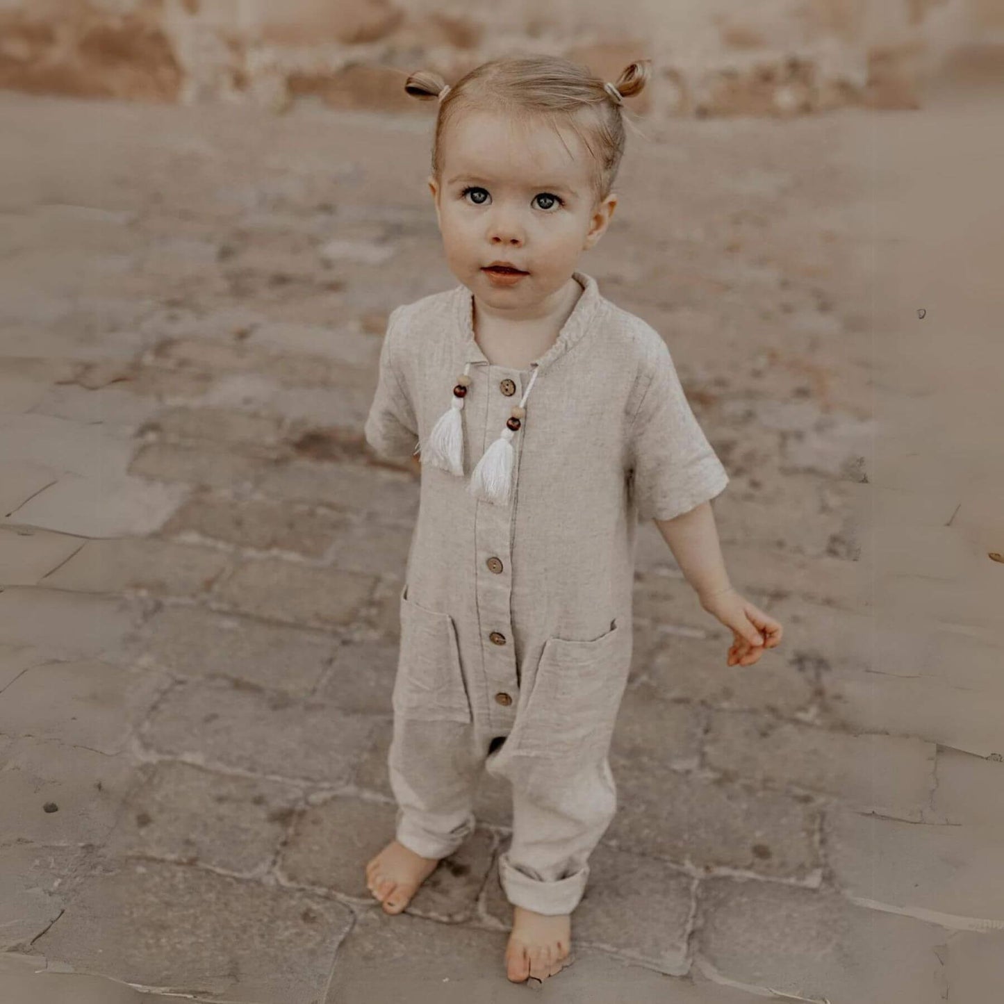 Girl Wearing Unique Love Design Boheme Linen Overall Cream