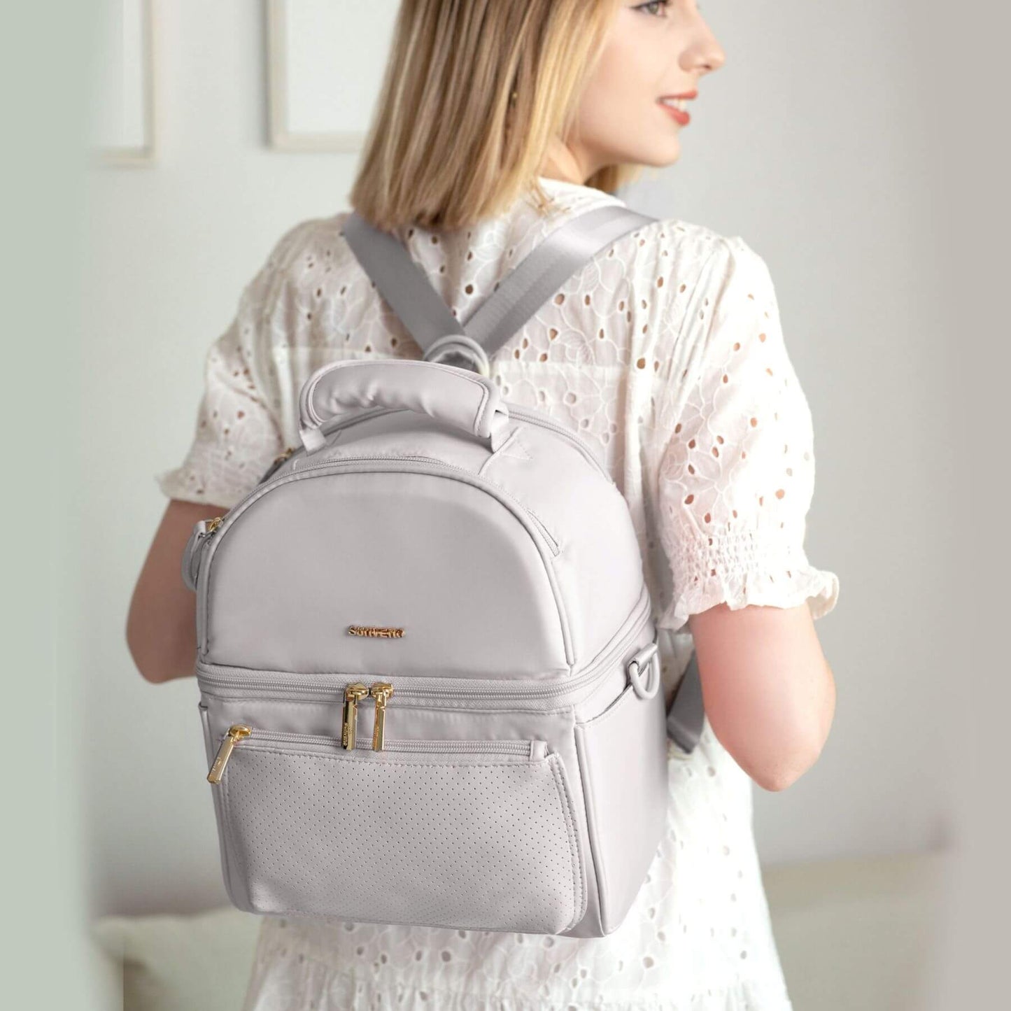 Woman wearing Sunveno Breastmilk Cooler Bag - Grey indoors