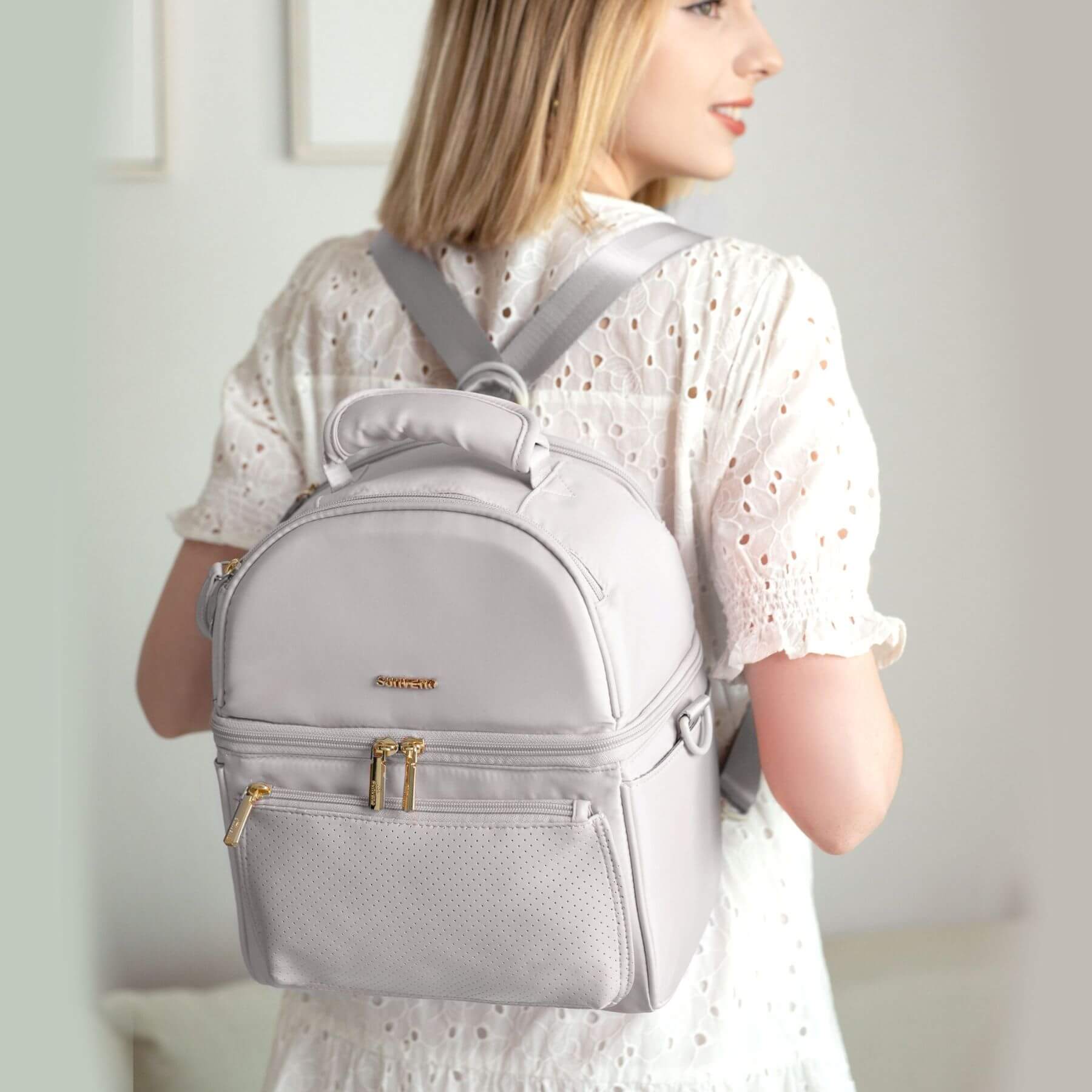 Woman wearing Sunveno Breastmilk Cooler Bag - Grey indoors