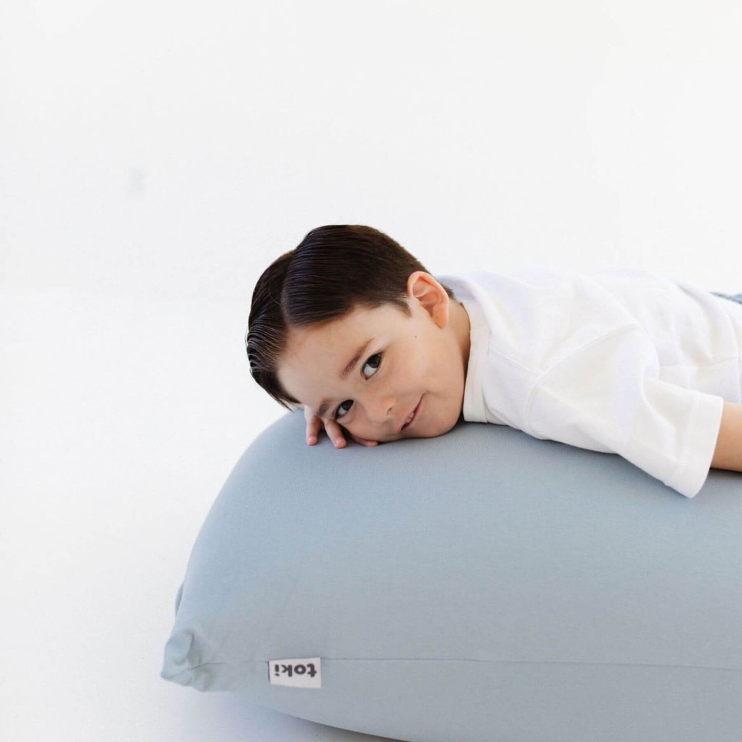 Kid lying on Toki Kids Breeze Bean Bag