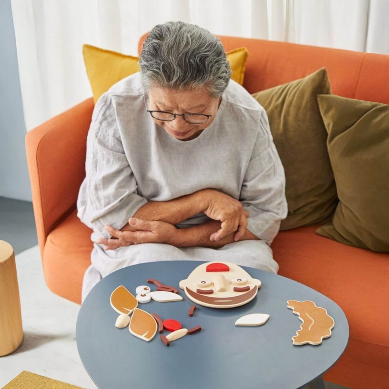 Grandma Playing PlanToys Build A Face