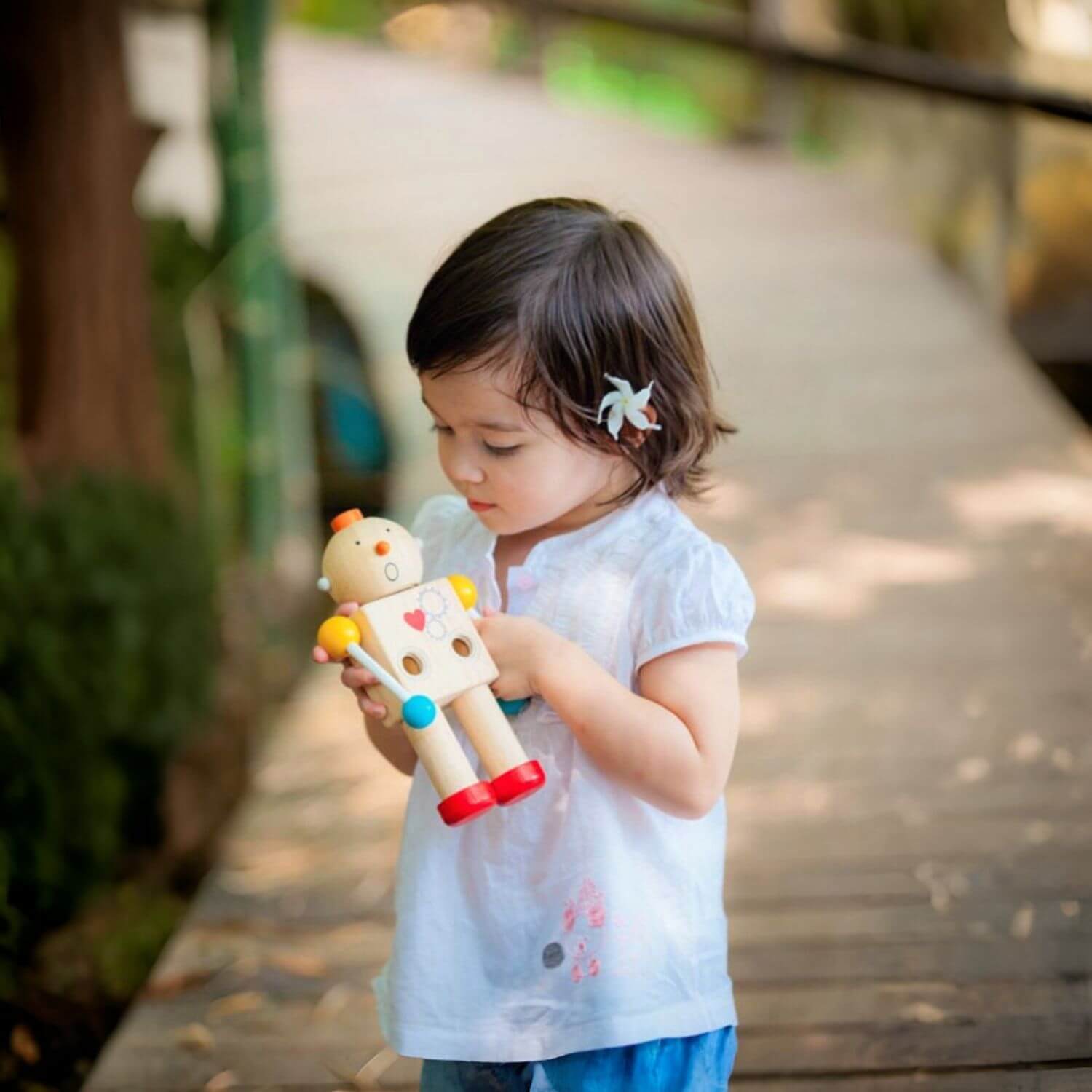 Girl Playing PlanToys Build-A-Robot