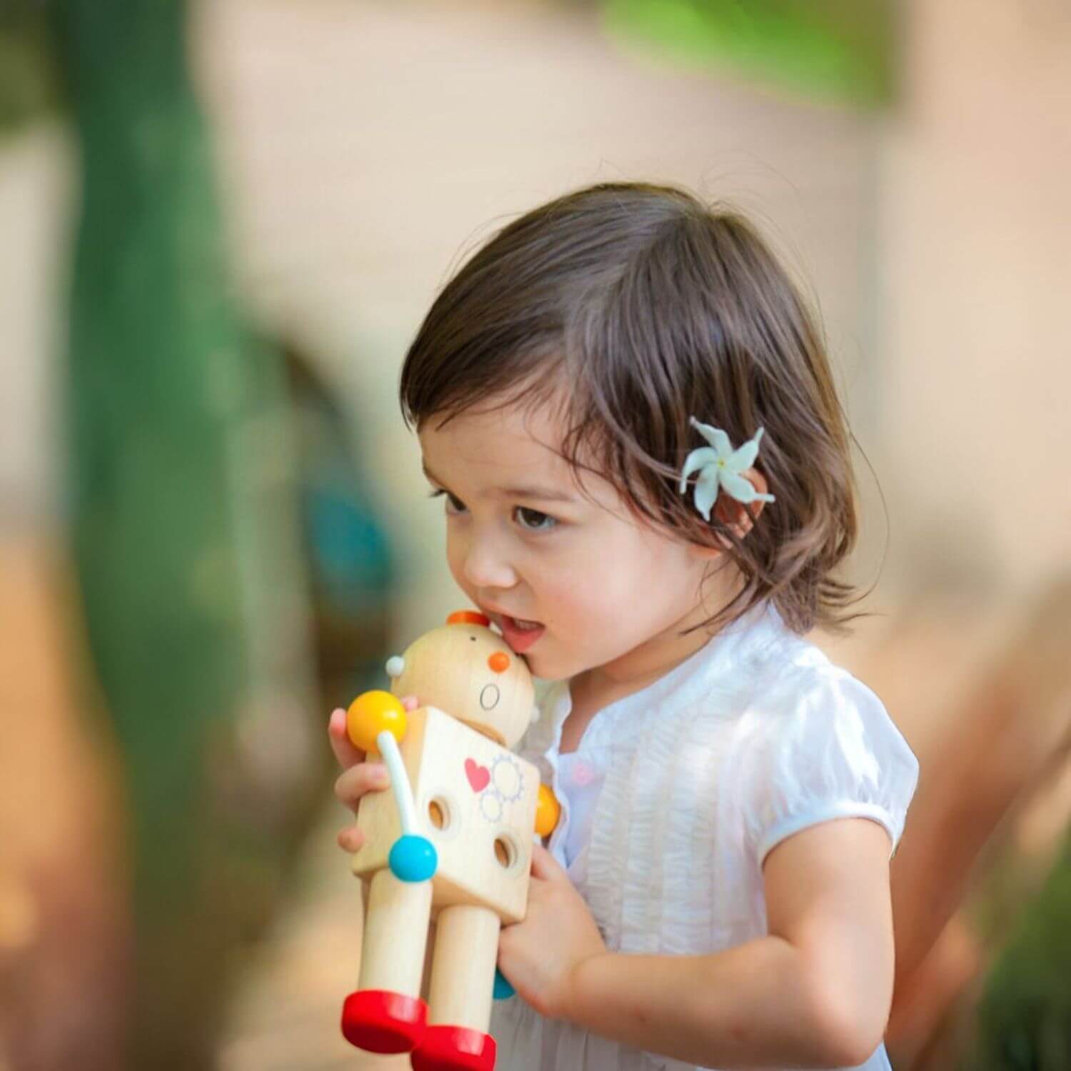 Girl Playing PlanToys Build-A-Robot