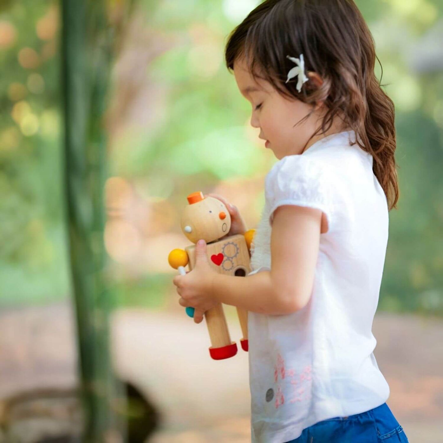 Girl Playing PlanToys Build-A-Robot