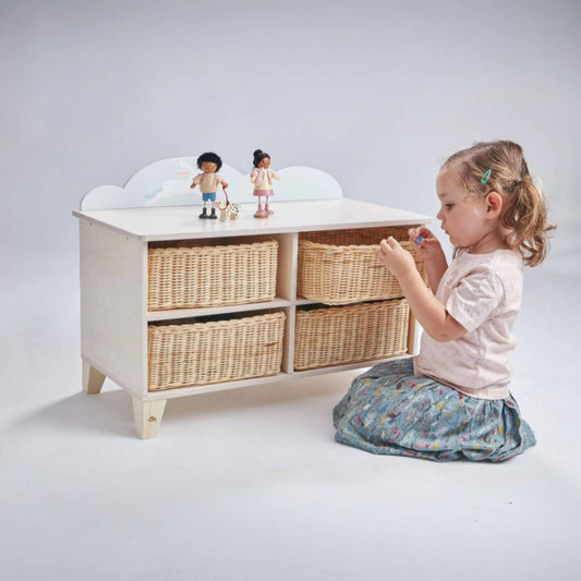 Child playing with Tender Leaf Bunny Storage Unit on a white background