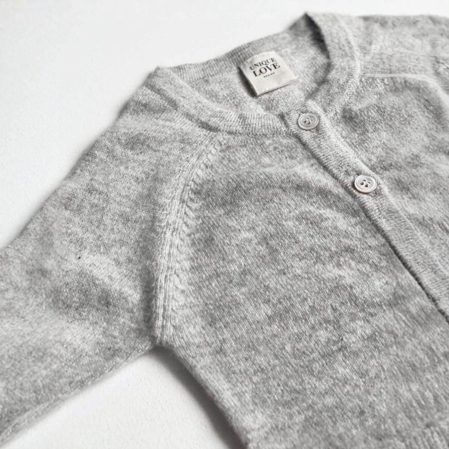 Detail of Unique Love Design Cashmere Baby Overall Grey