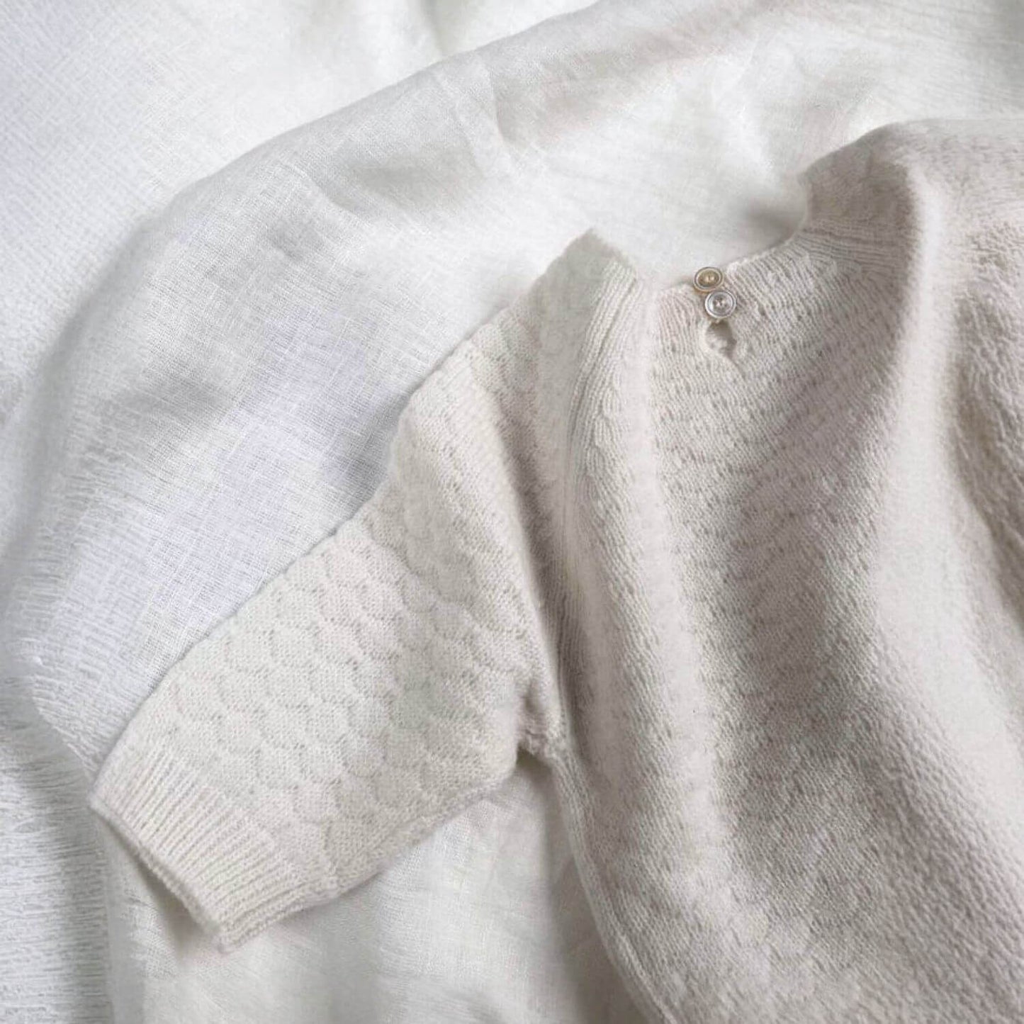 Detail of Unique Love Design Cashmere Baby Sweater Off White