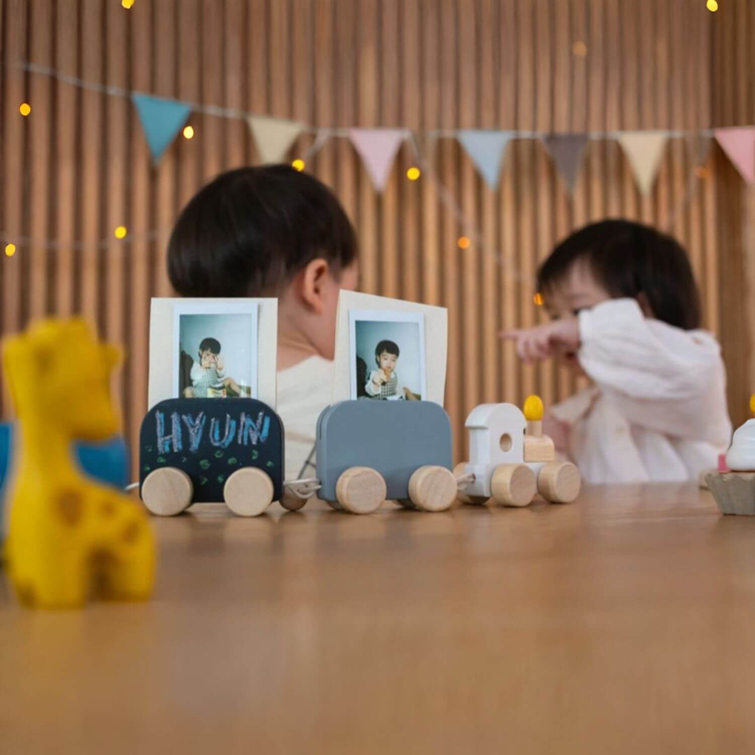 Kids Playing PlanToys Celebration Train