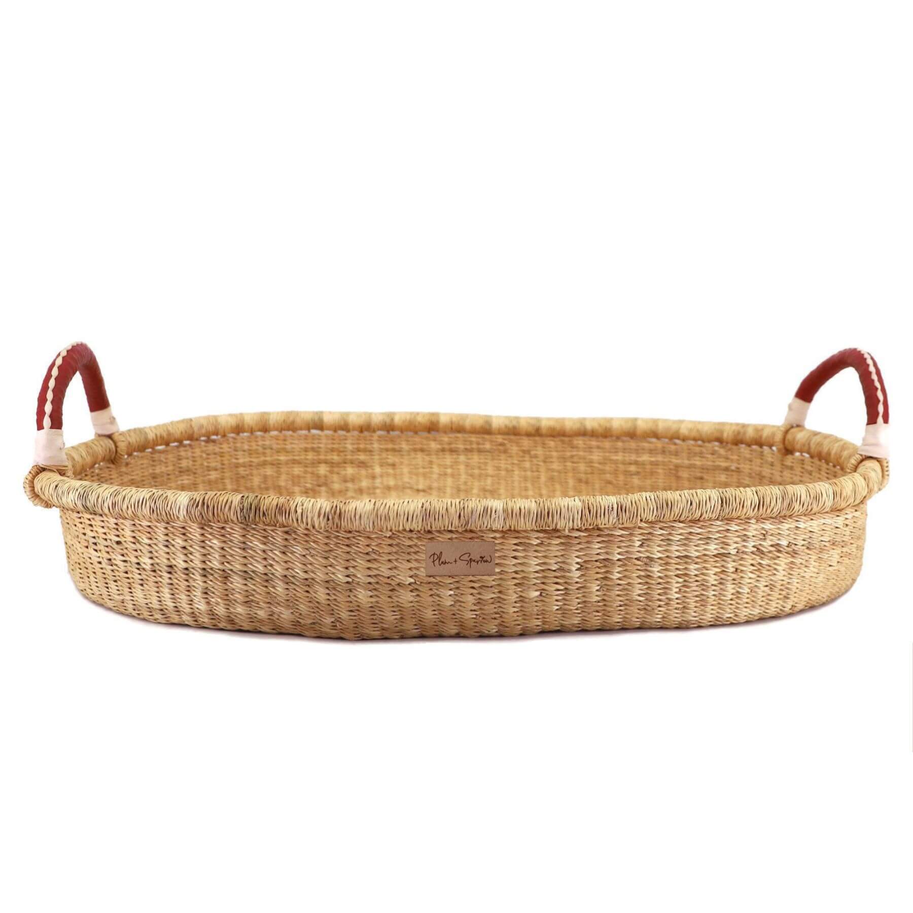 Plum+Sparrow Changing Basket Cognac + Cream Handle on a white background