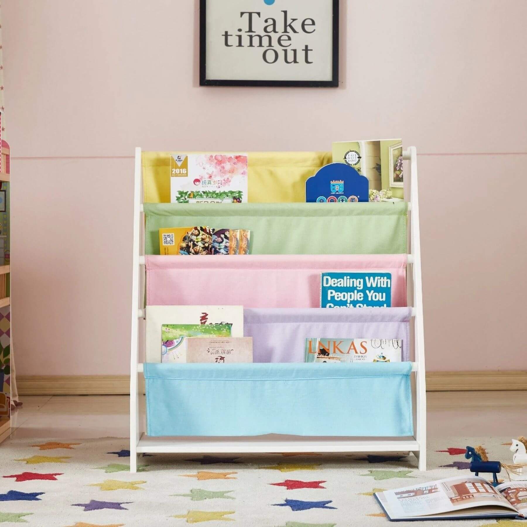 Charlie White Kids Wooden Canvas Sling Magazine Bookcase with books on   floor