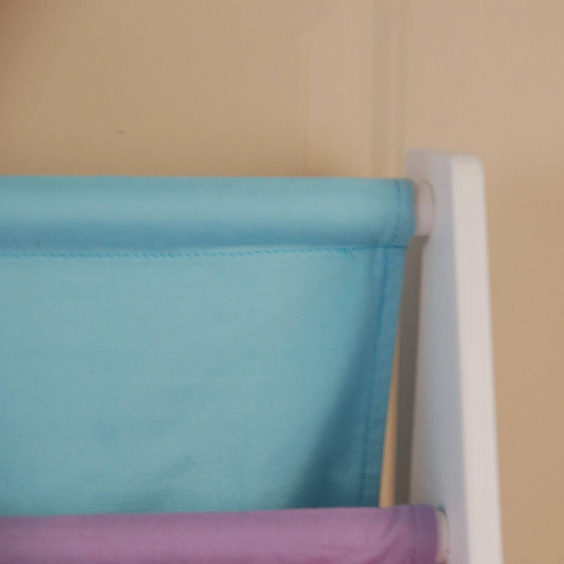 Close-up of Charlie White Kids Wooden Canvas Sling Magazine Bookcase