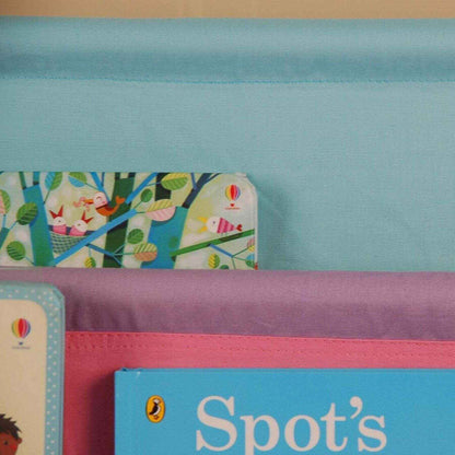 Close-up of Charlie White Kids Wooden Canvas Sling Magazine Bookcase