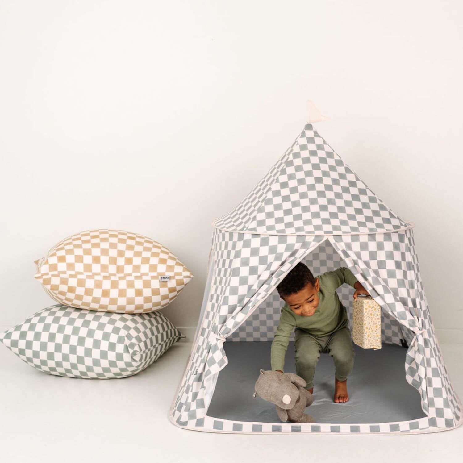 Boy playing toys in Toki Kids Checker Matcha Play Tent