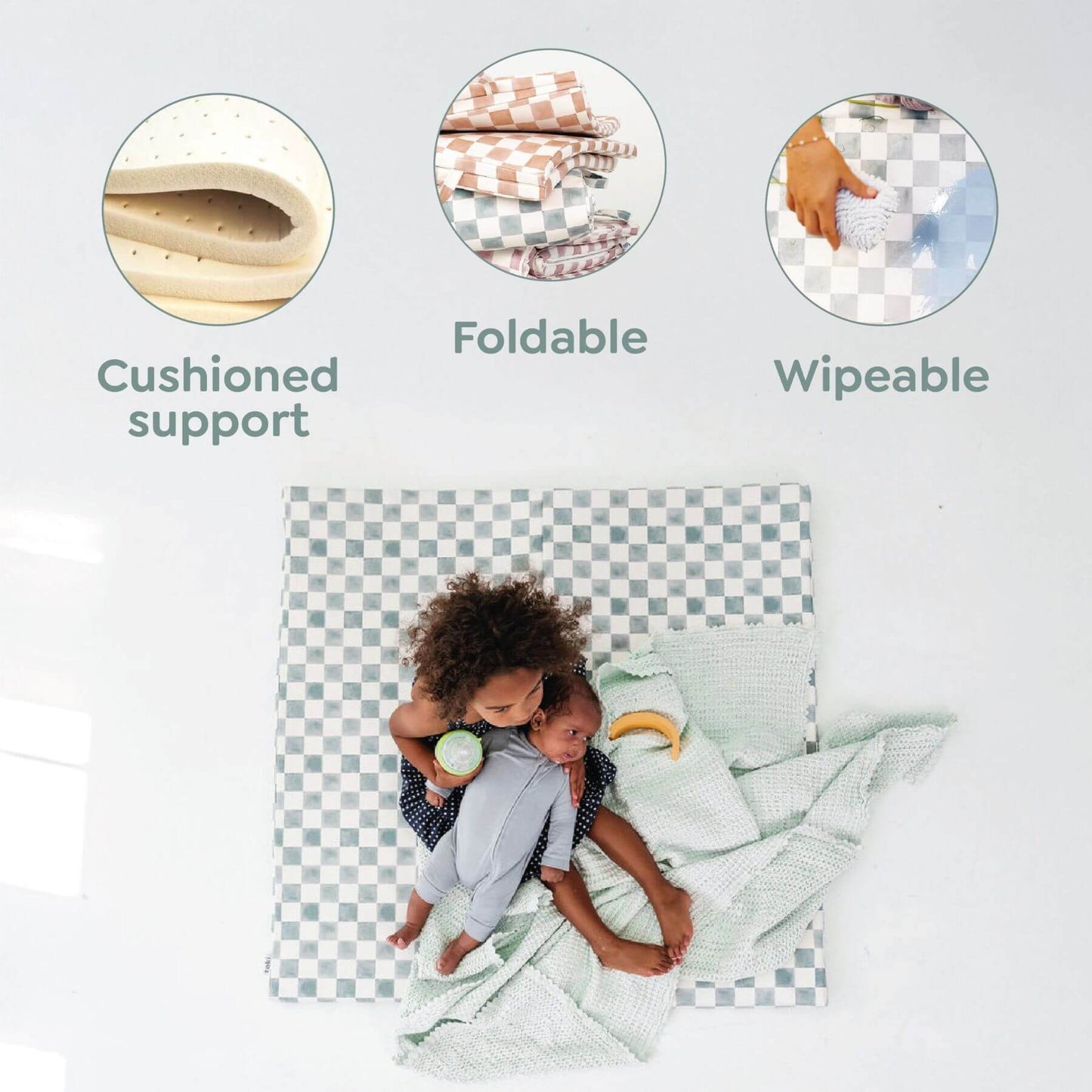 Child sitting on a cushion with text highlighting cushioned support, foldable, and wipeable features.