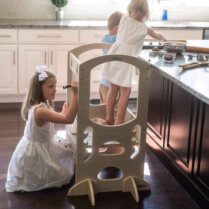 Girl Standing on Little Partners Chef Series Learning Tower Natural, Playing with siblings