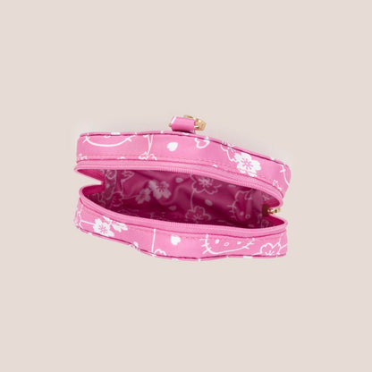 Hello Kitty® × JuJuBe Cherry Blossoms Flower Mini Bag, shown open to reveal a matching pink floral interior.