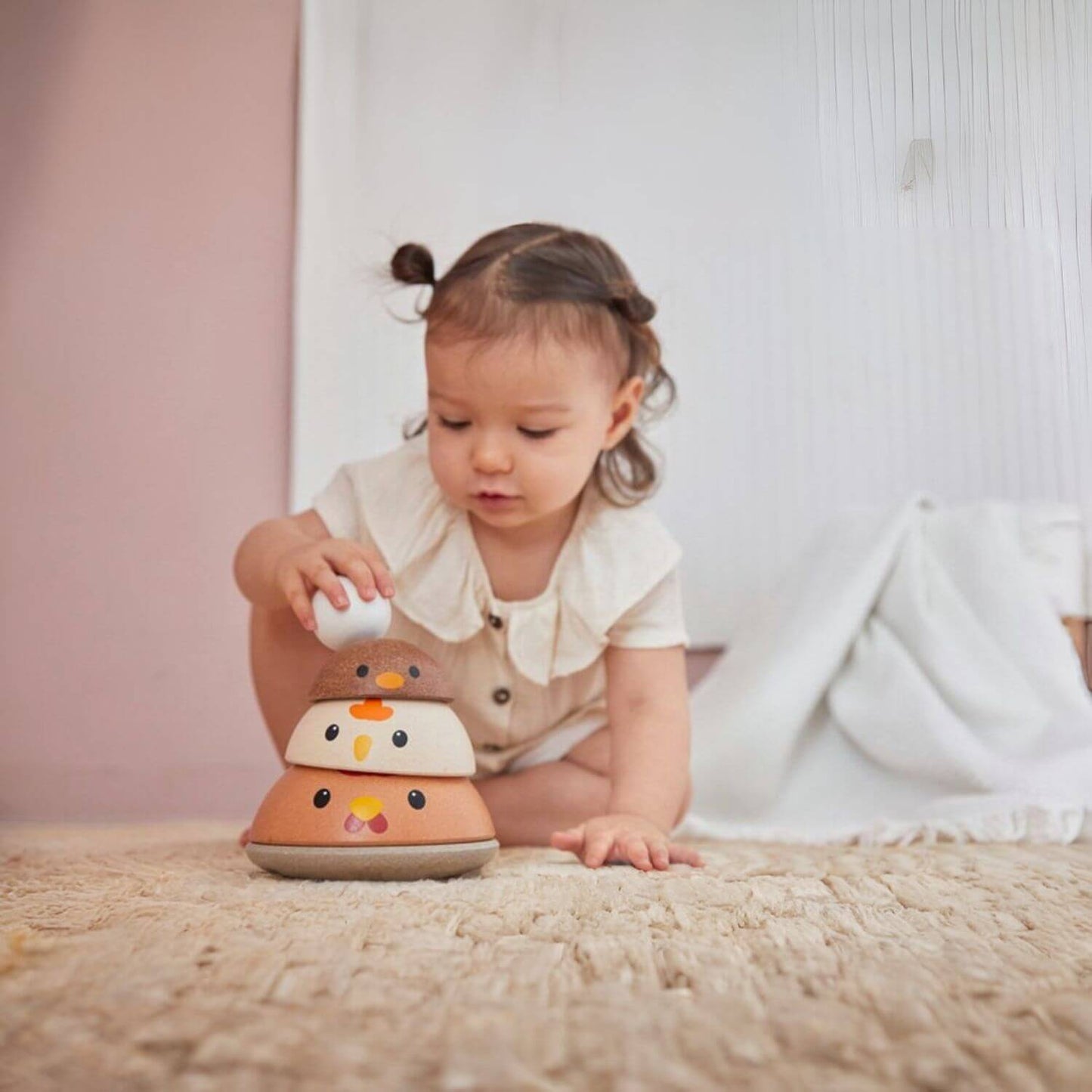 Girl Playing PlanToys Chicken Nesting - Modern Rustic