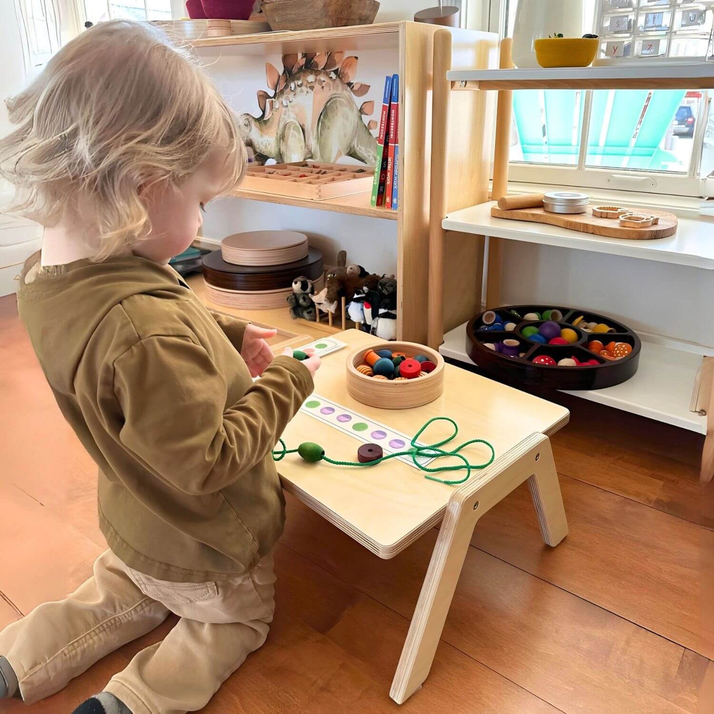 Kid Playing at RAD Children's Furniture Chowki Table