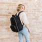 Girl Carrying JuJuBe Classic Diaper Backpack Black