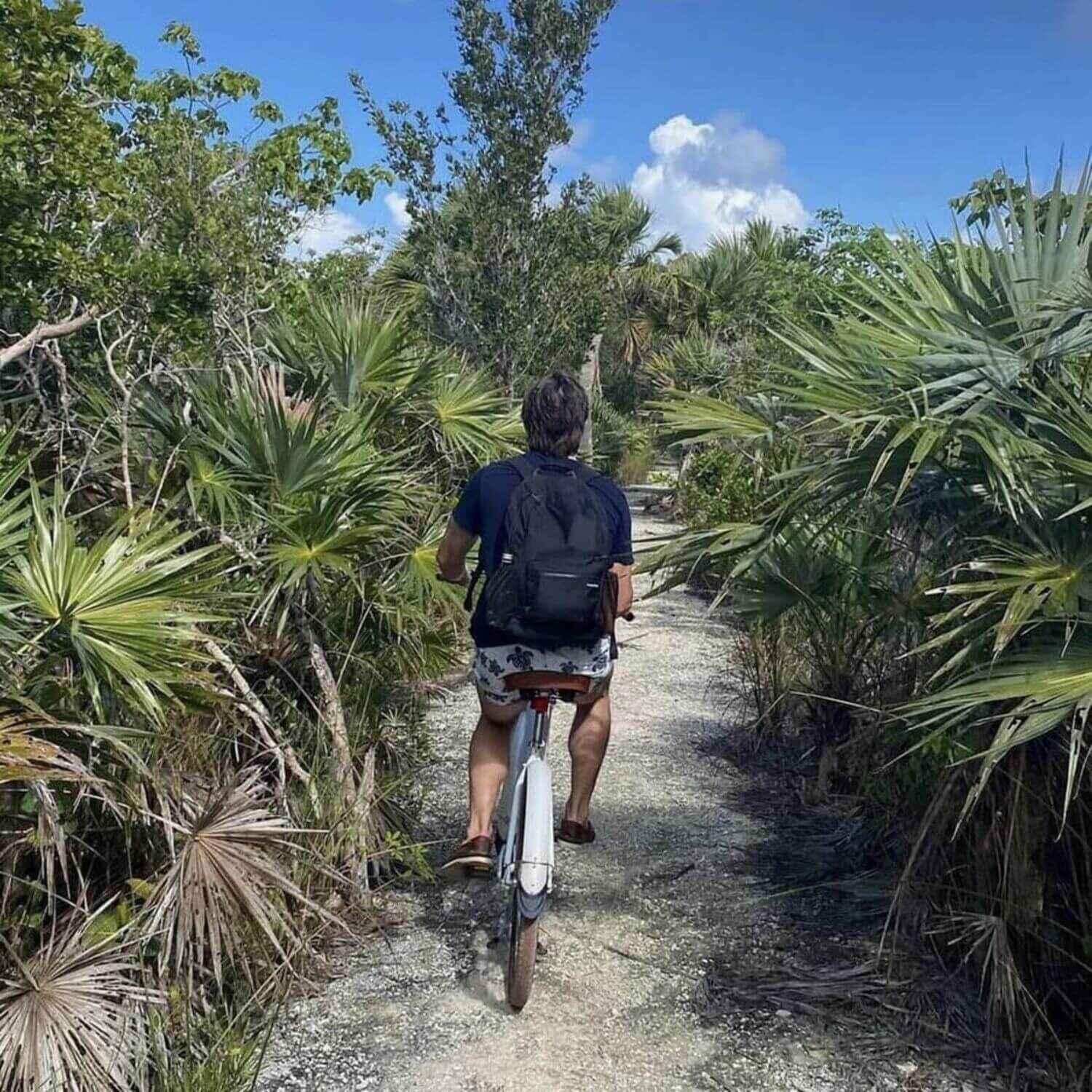 Man on Bike Carrying augustnoa Classic Noa Backpack Black