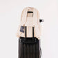 augustnoa Classic Noa Backpack Cream attached to Luggage