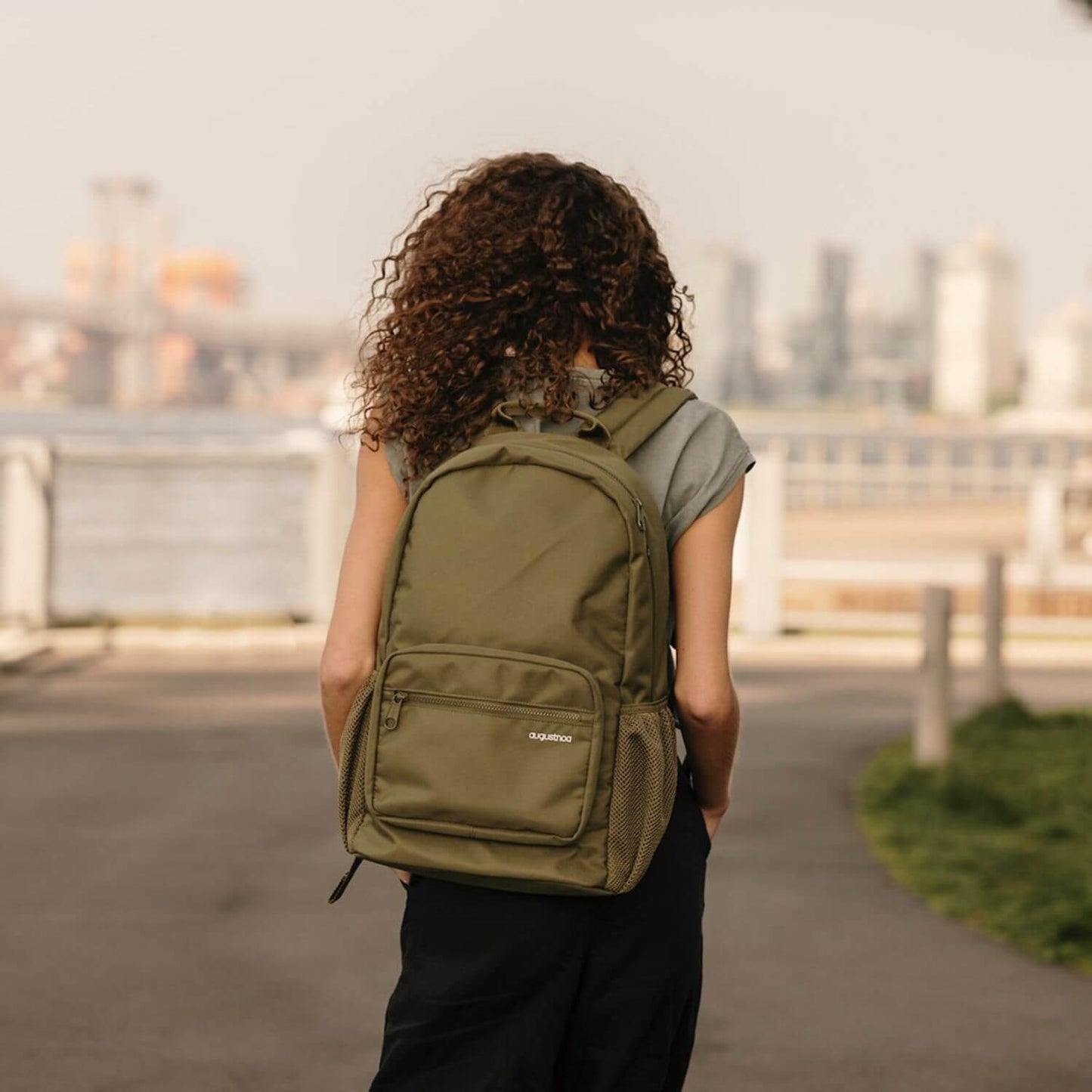 Woman Carrying augustnoa Classic Noa Backpack Olive