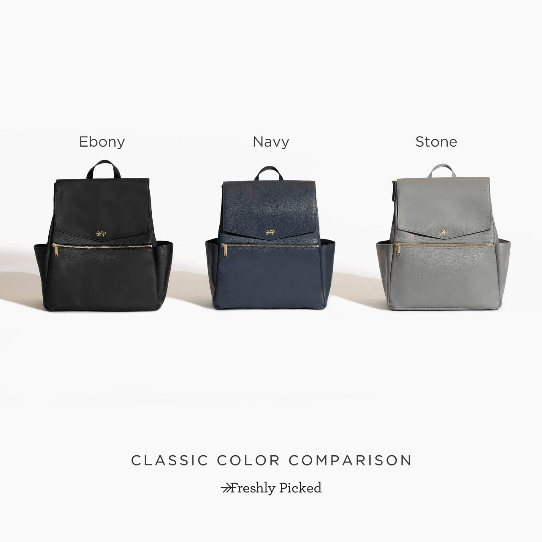 Three Classic Diaper Bag II in Ebony, Navy, and Stone colors