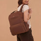 Woman wearing JuJuBe Classic Diaper Backpack Espresso