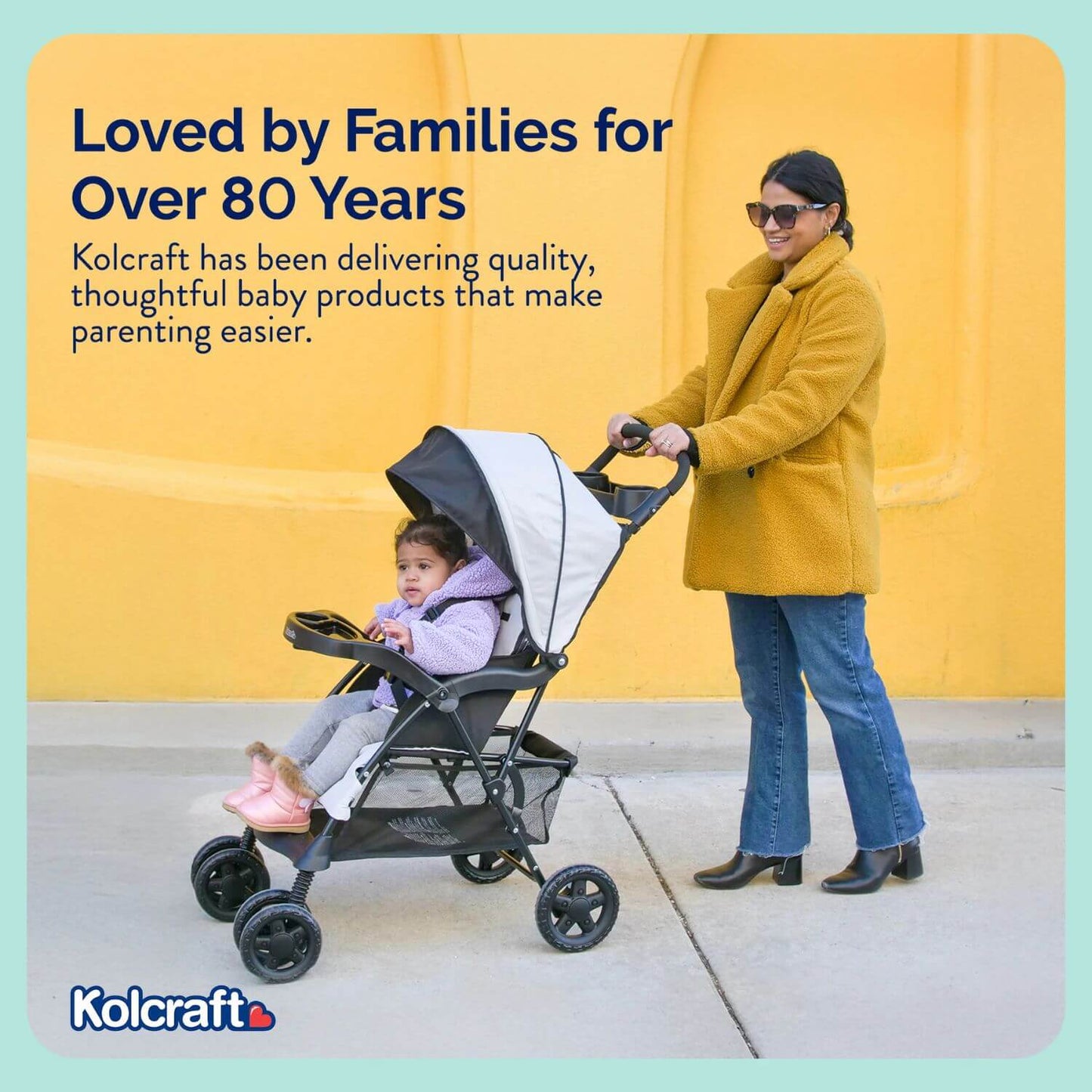 Woman pushing a stroller with a child, set against a yellow wall with Kolcraft branding text.